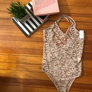 Pink laced bodysuit
